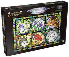 Ensky Totoro Seasonal Tidings Art Crystal Puzzle window display that gleams with light through the pieces