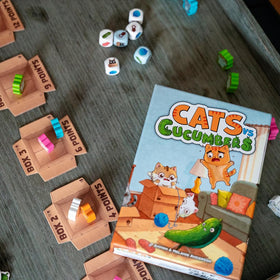 Envy Born Games wooden meeples stand tall, signaling durable components for repeated play.