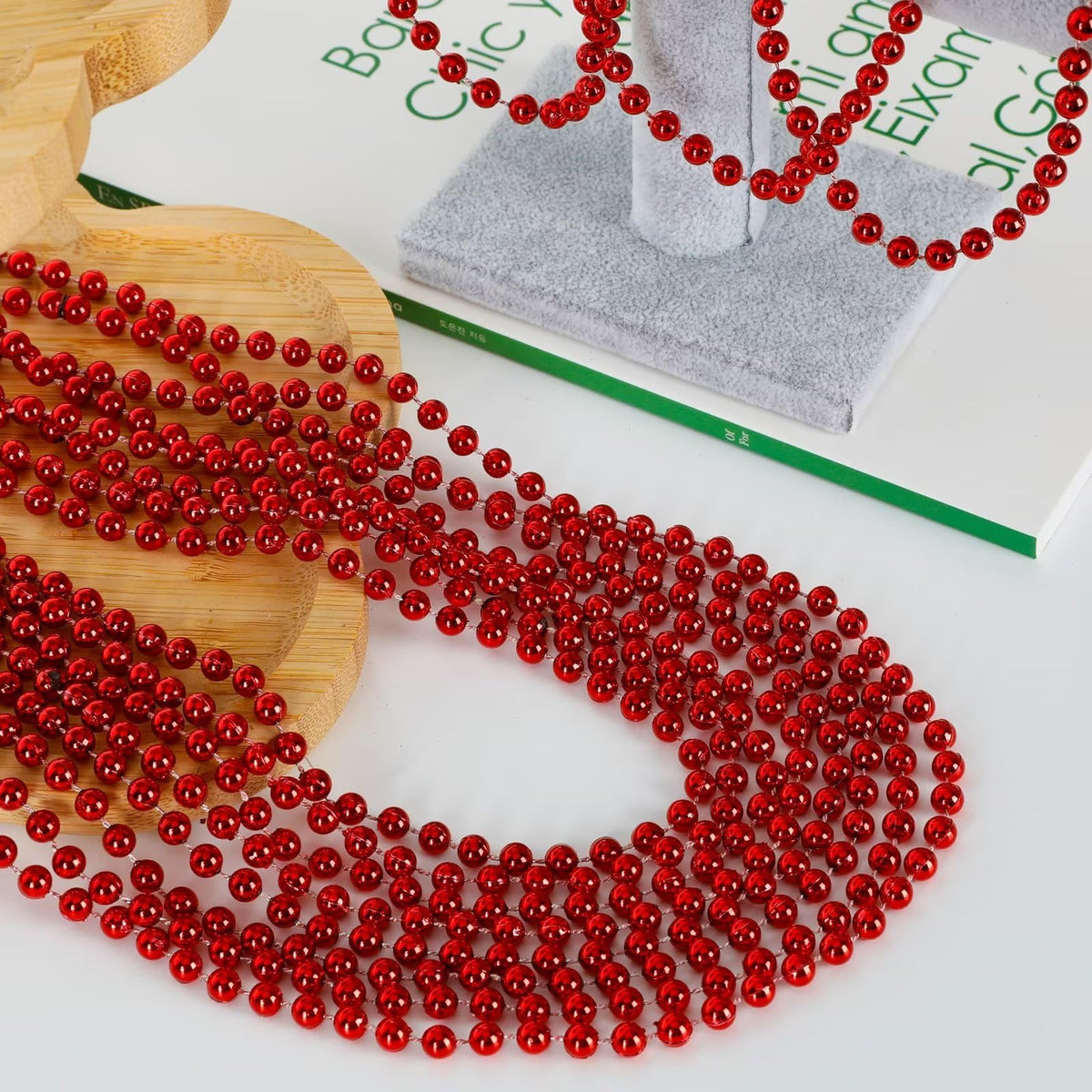 EOBOH red bead necklace close-up with glossy finish
