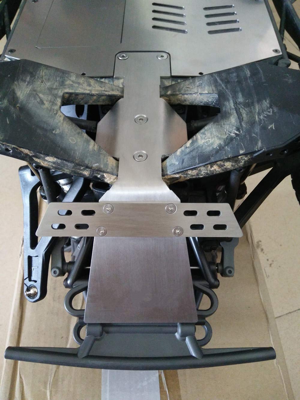 EPTNNASO middle skid plate right shields inner components in rocky terrain