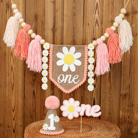 Ereniko boho pink daisy highchair banner enhances first birthday photos.