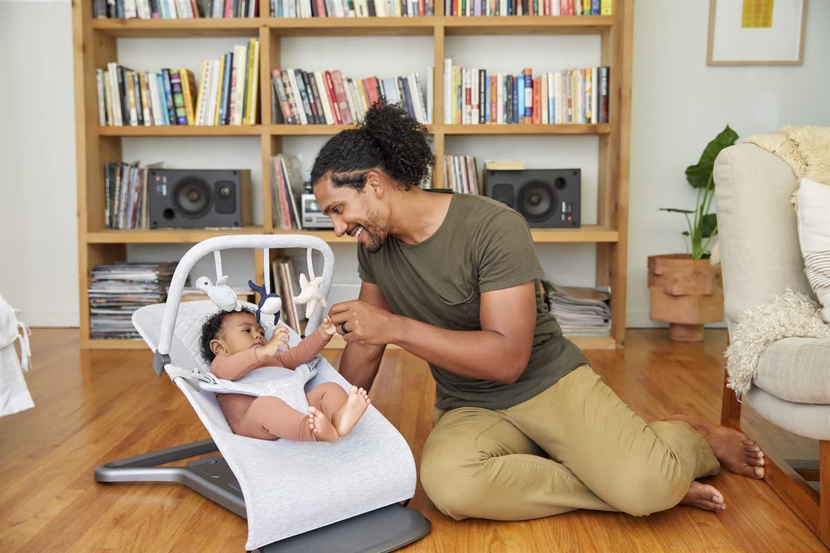 Ergobaby Evolve Toy Bar starfish crinkle promotes tactile curiosity.