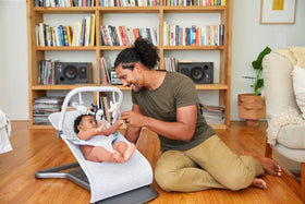 Ergobaby Evolve Toy Bar starfish crinkle promotes tactile curiosity.