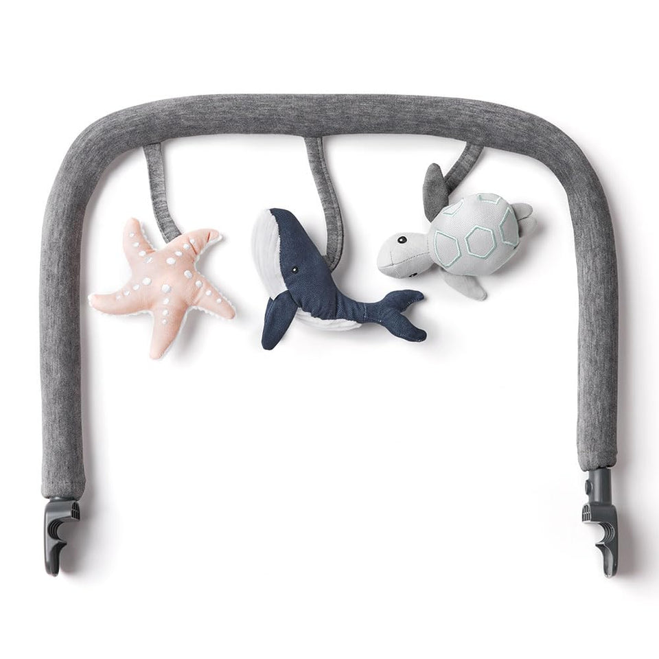 Ergobaby Evolve Ocean Wonders turtle bell toy enhances visual and tactile play for baby