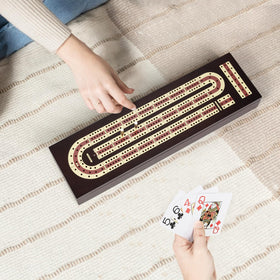 ESENHARBER cribbage board with two playing cards for portable fun.