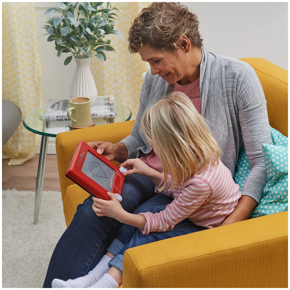 Etch A Sketch Classic Red suitable for ages 3 and up.