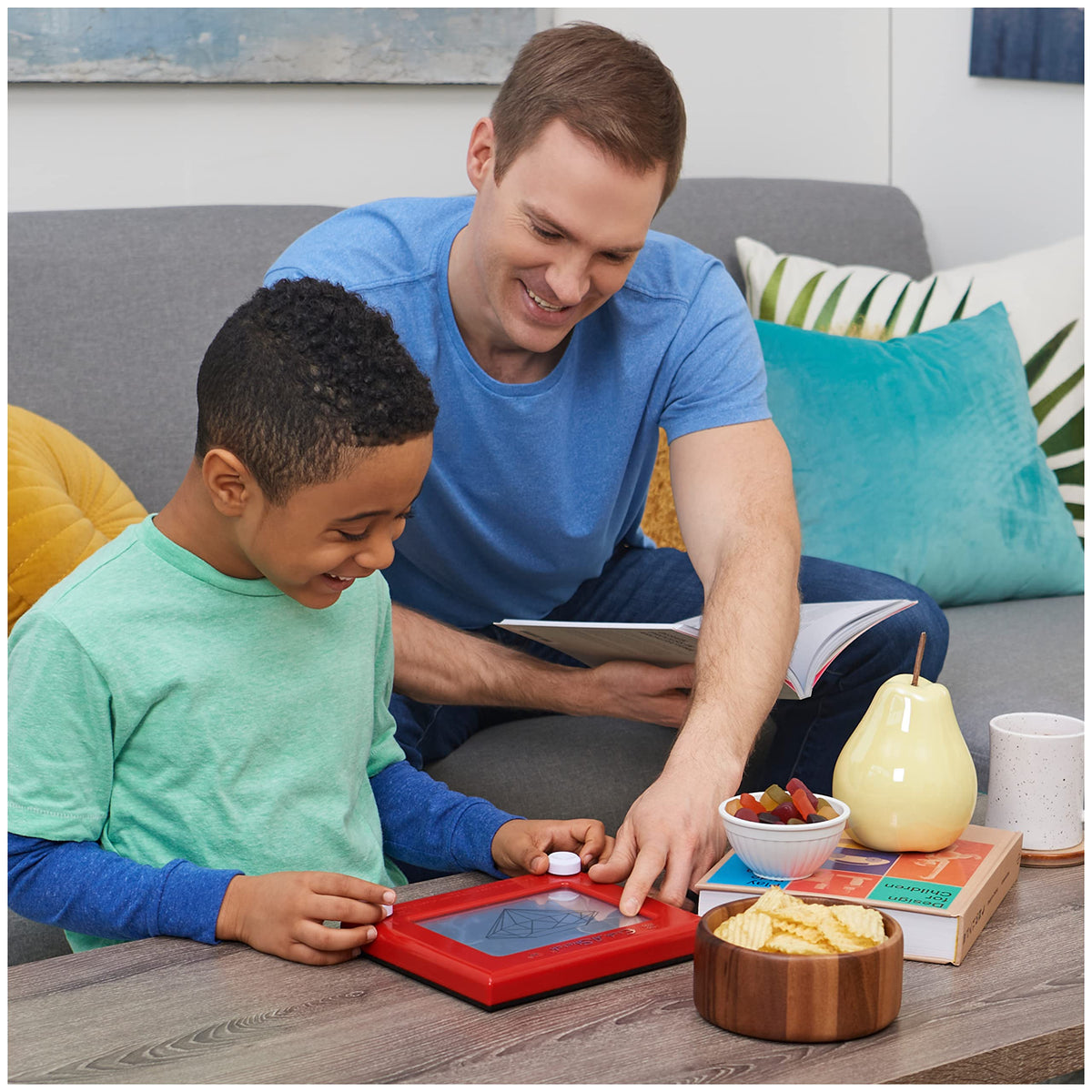 Etch A Sketch Classic Red iconic frame sparks nostalgic play.