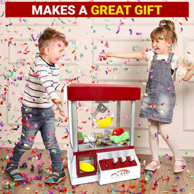Etna mini arcade claw machine in action capturing lively play.