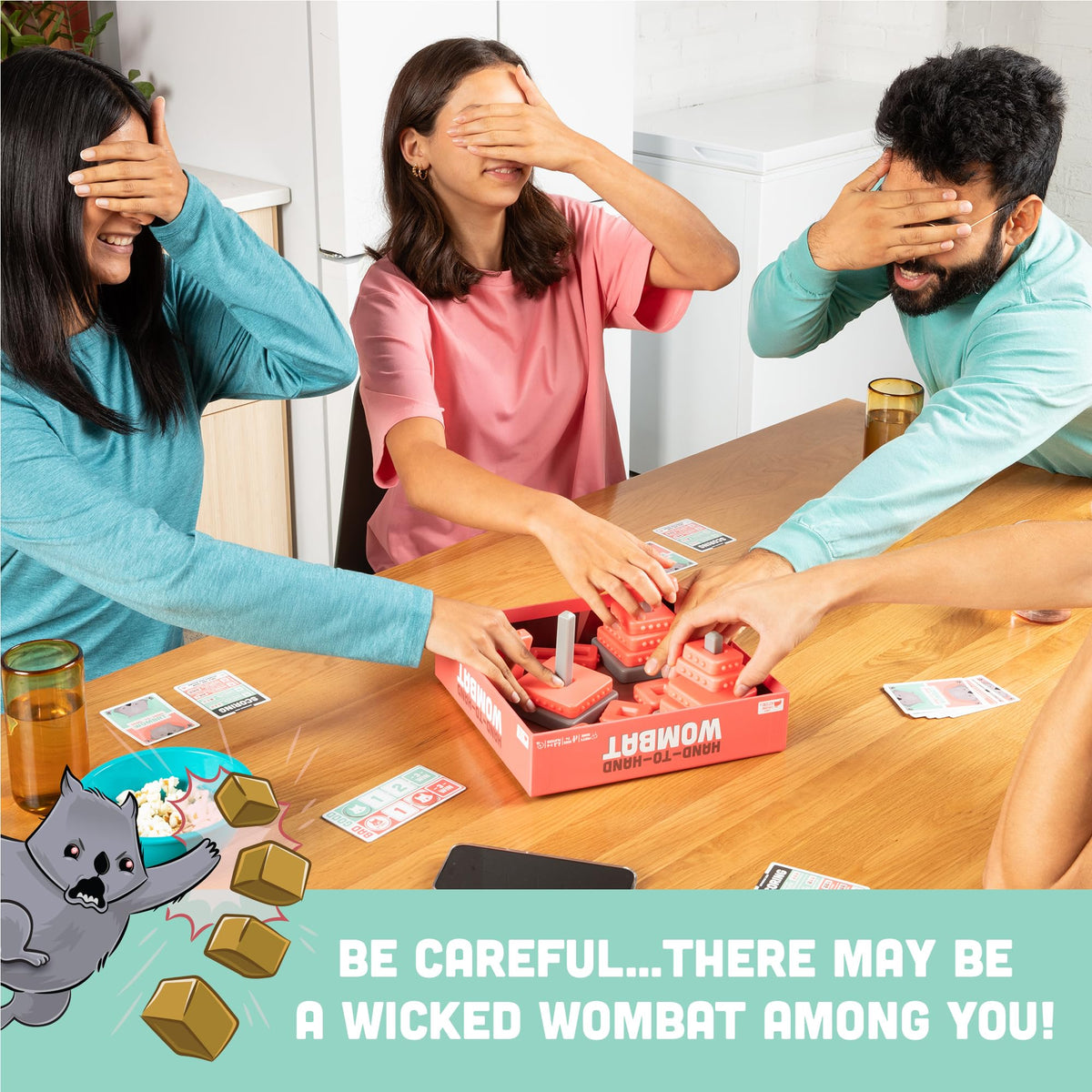 Exploding Kittens Hand to Hand Wombat players blindfolded for cooperative strategy