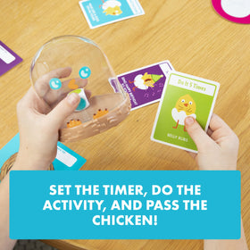 Exploding Kittens Hurry Up Chicken Butt box and cards on a table.