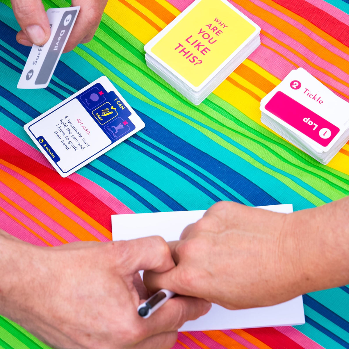 Exploding Kittens Why Are You Like This setup is party-ready for social play.