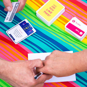 Exploding Kittens Why Are You Like This setup is party-ready for social play.