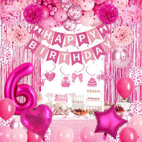 Fantspati pink confetti balloons add festive texture and sparkle.