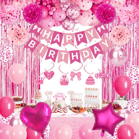 Fantspati pink hanging swirls frame ceilings for immersive party ambiance.