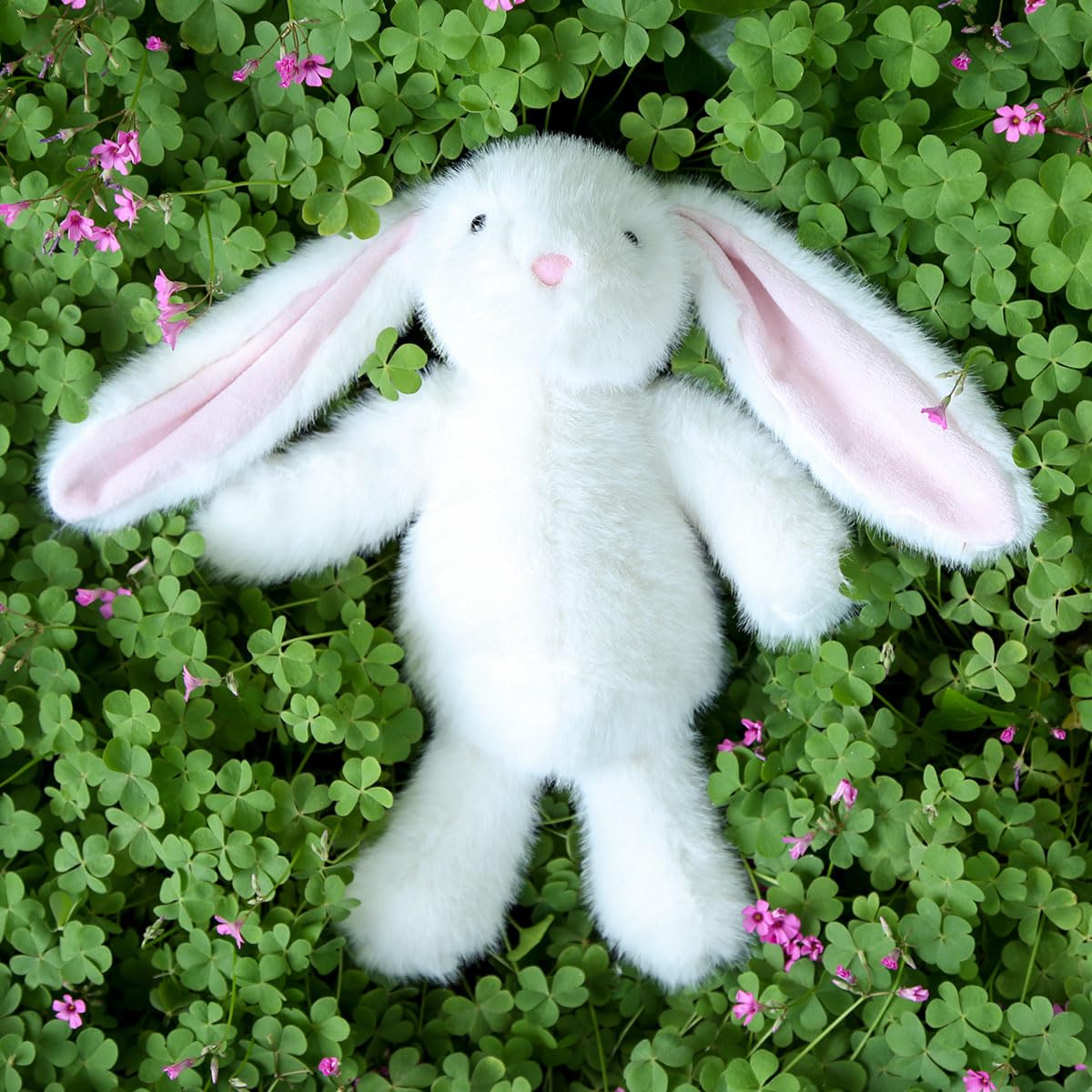 Farnesaa plush bunny, ultra-soft fabric and weighted design for comfort.