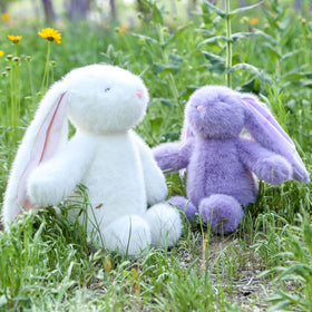 Farnesaa weighted bunny green plush, versatile for play and relaxation.