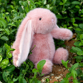 Farnesaa weighted bunny side-hug captures snug portability for travel.
