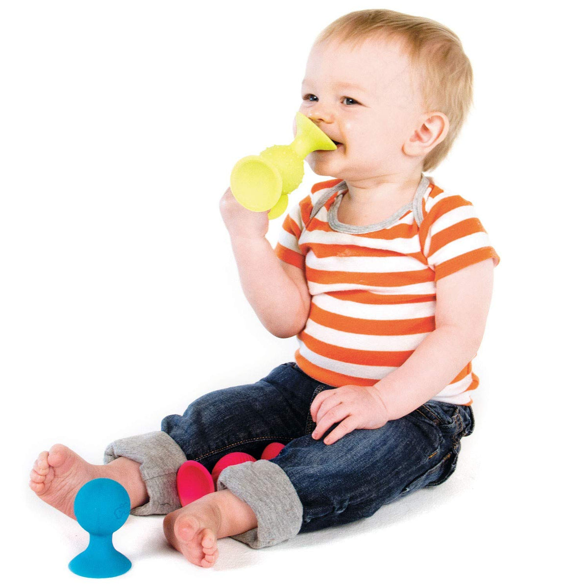 Fat Brain PipSquigz suction cup play set sticks to surfaces for creative exploration.