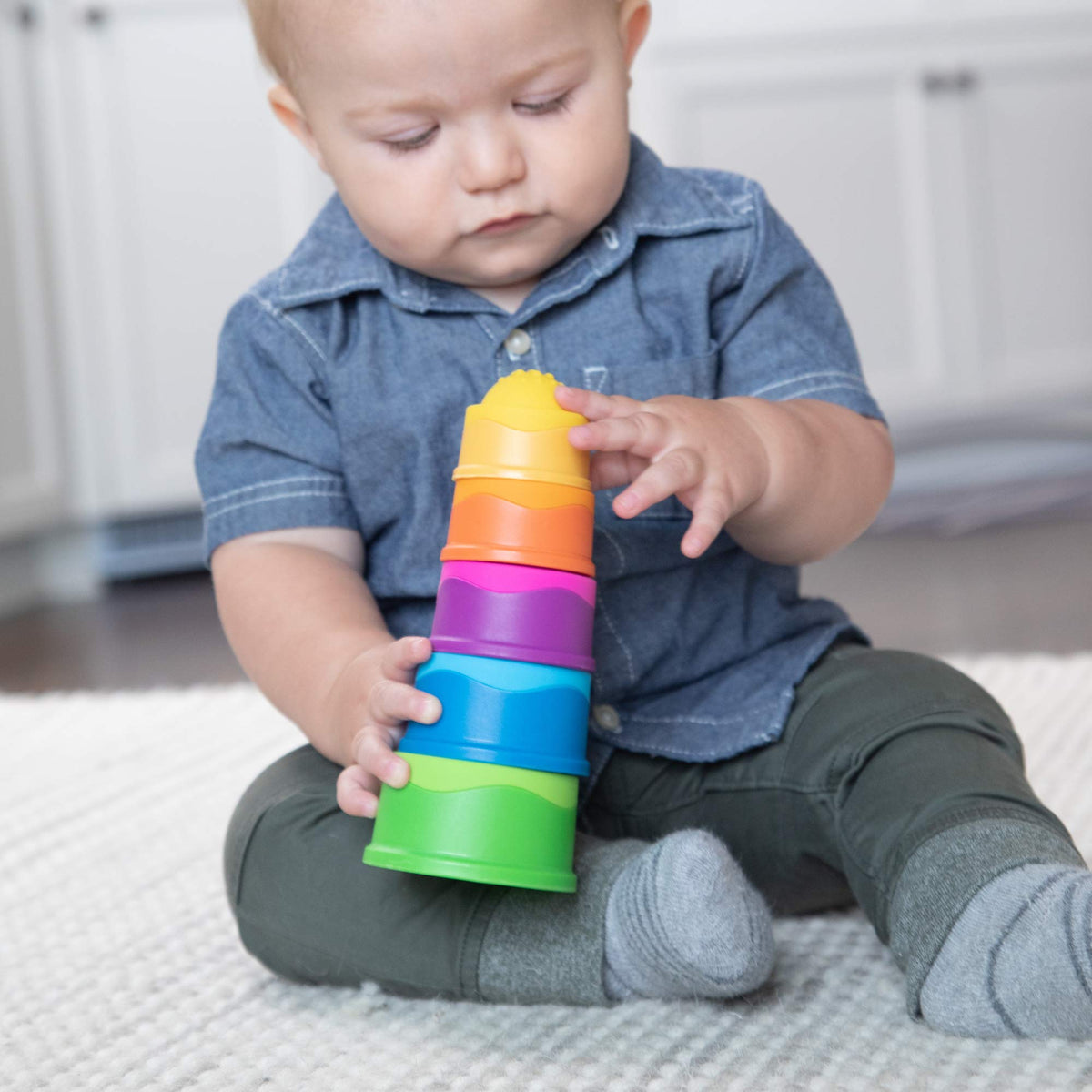 Fat Brain Toys Dimpl Stack nesting cups showing versatile nesting and discovery.