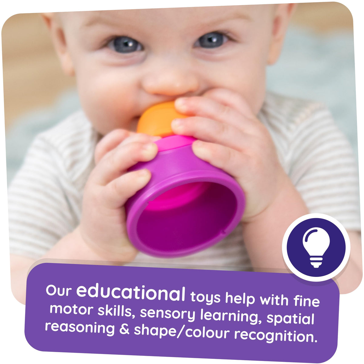Fat Brain Toys Dimpl Stack toddler hands gripping for dexterity development.