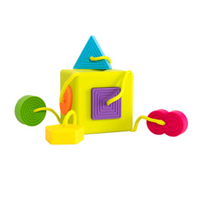 Fat Brain Toys OombeeCube with attached shapes for easy grasp and motor practice.