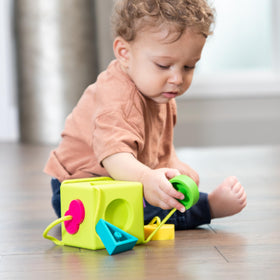Bright, colorful OombeeCube pieces to stimulate visual interest.