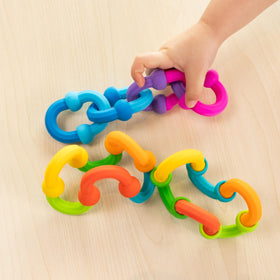 Fat Brain Toys Plip Links strengthen fine motor skills through push-and-pull play.