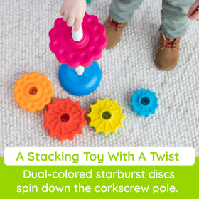 Fat Brain Toys SpinAgain colorful discs support sorting by color and shape.