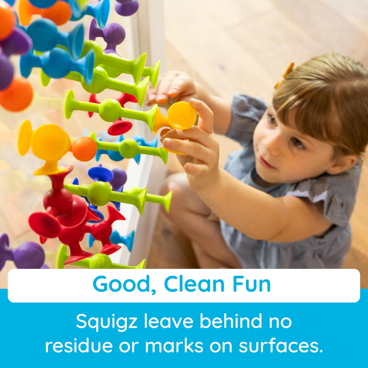 Fat Brain Toys Squigz pieces defy gravity with playful suction experiments on tub walls
