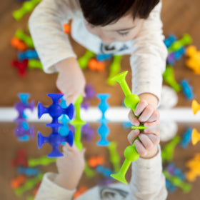 Fat Brain Toys Squigz encourage collaborative play for families during bath or playtime