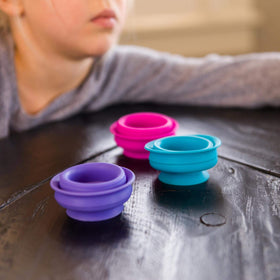 Fat Brain Toys Suction Kupz six-piece set sparks creative open-ended play.