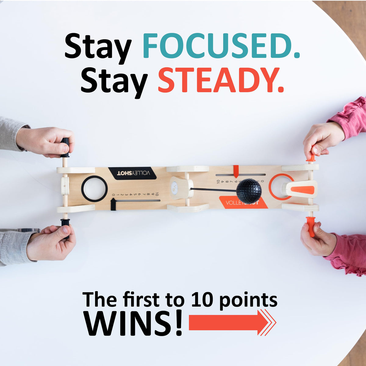 Hand-eye coordination improves during fast rallies with VolleyShot wooden game.