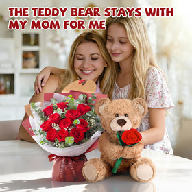feeking teddy with pink balloon and card, a charming gift moment.