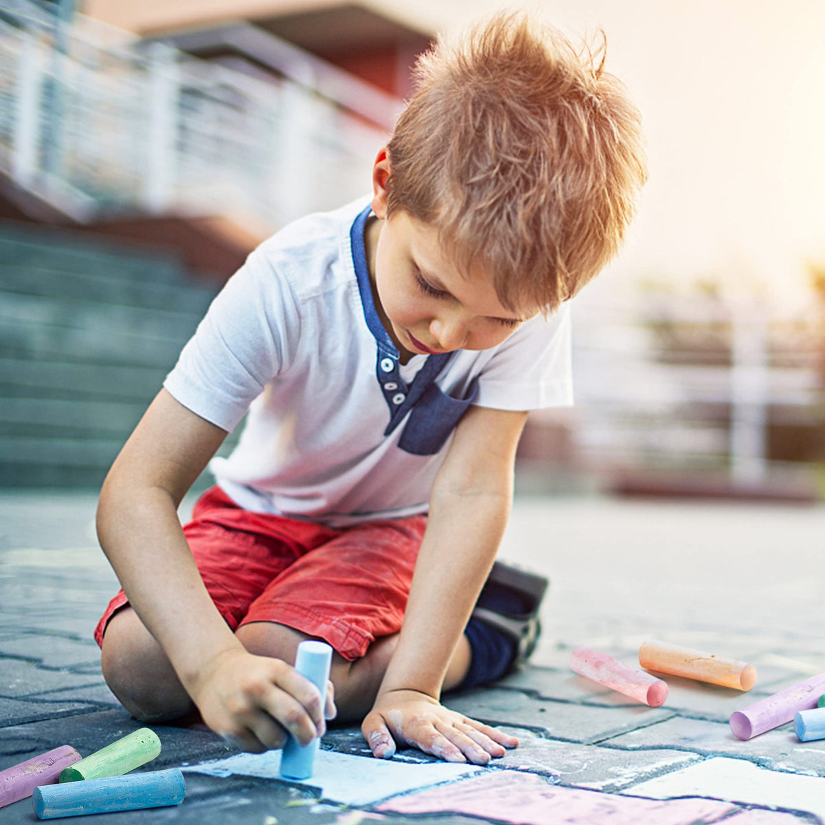 Feela family-friendly outdoor art kit for sidewalks, playgrounds, and classrooms.