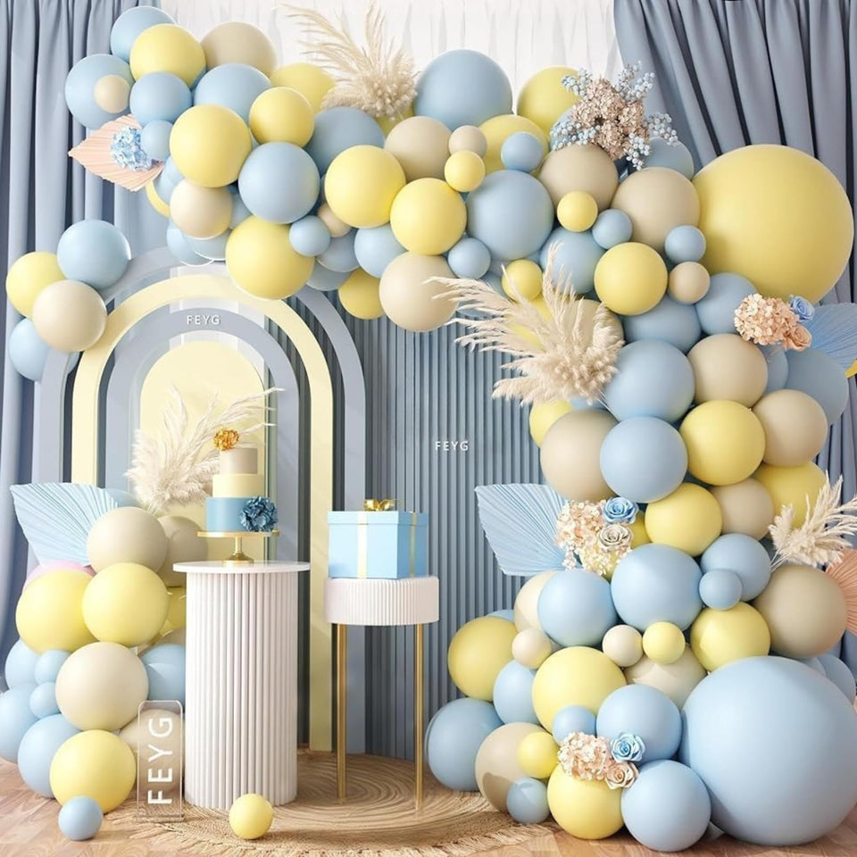 FEYG pastel blue yellow balloon garland arch setup for a festive backdrop