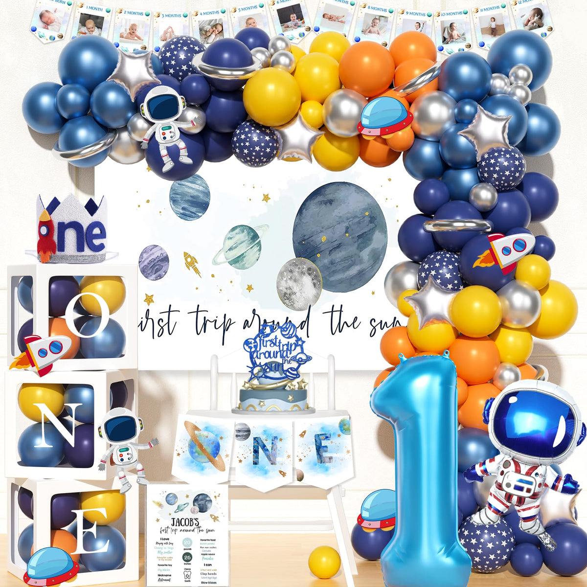 Fiesec space balloon garland creates a vibrant first-birthday backdrop
