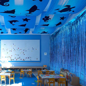 FineCheer blue foil fringe curtain adds sparkling accents for quick, eye-catching party decor.