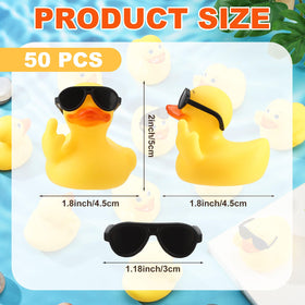 Fingertip WD rubber duck close-up shows soft texture and detachable sunglasses.