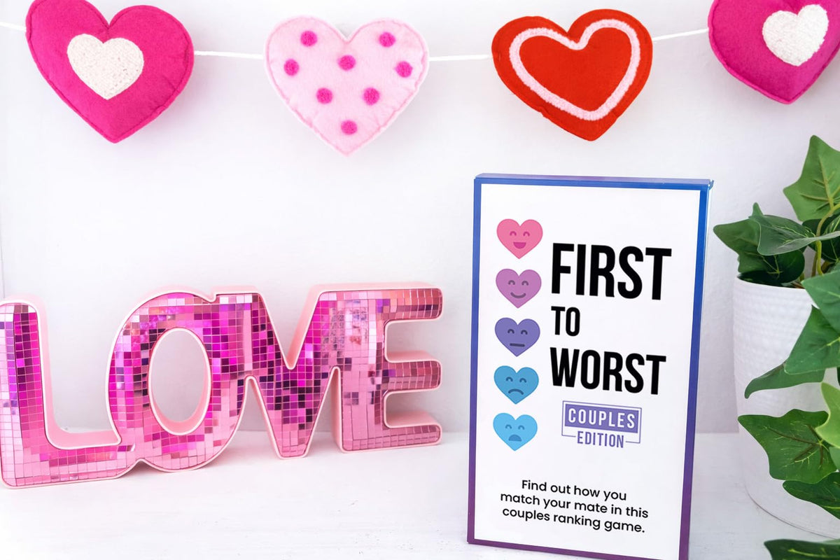 First to Worst Couples Edition cards spread invites immediate play and playful guessing