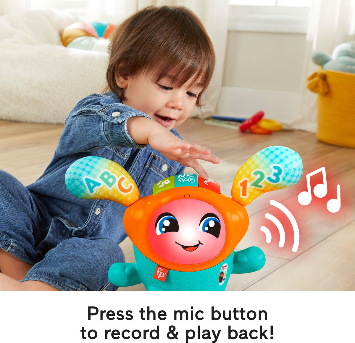 Fisher-Price DJ Bouncin’ Beats mic button records and plays back playful remix effects.