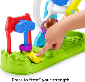 Weight lever on the Ferris Wheel lifts the weight, encouraging cause-and-effect play.
