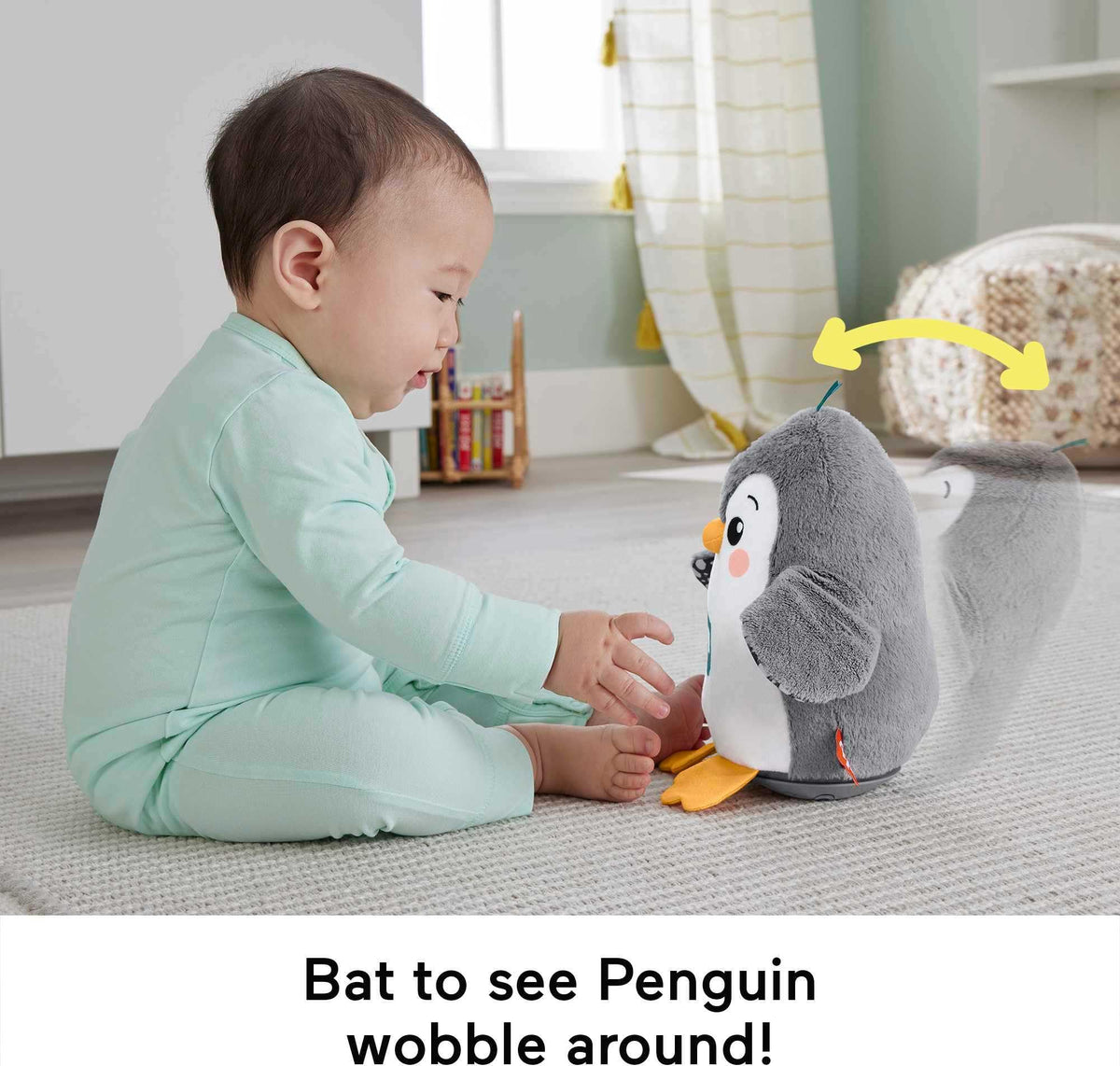 Fisher-Price Flap & Wobble Penguin high-contrast patterns support early visual tracking.