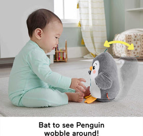 Fisher-Price Flap & Wobble Penguin high-contrast patterns support early visual tracking.