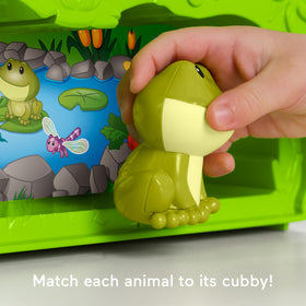 Fisher-Price Little People Forest Friends Carry Case tree open with figures for imaginative play.