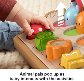 Fisher-Price Hide & Peek Pop-Up leaf slide reveals fox, encouraging fine motor exploration.