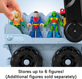Children playing Batman adventures with the Bat-Tank