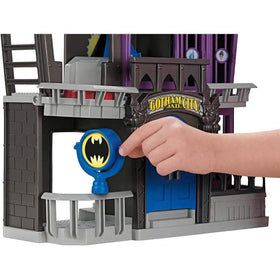 Fisher-Price Imaginext Gotham City Jail doors open for jailbreak scenes.