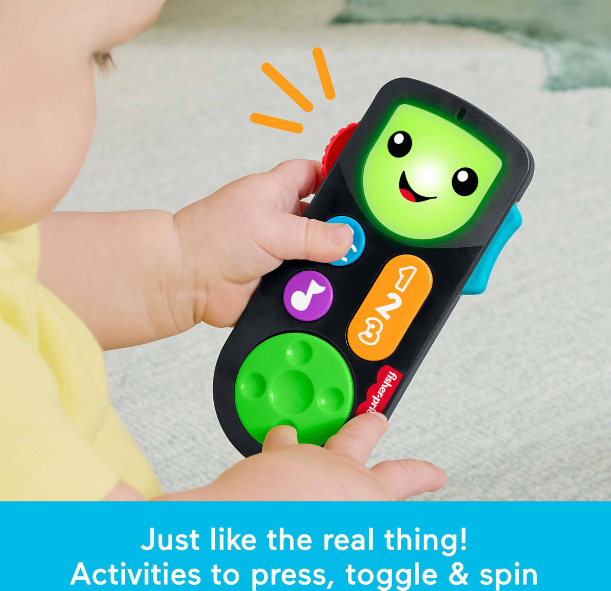 Fisher-Price Laugh & Learn colorful buttons invite early color and shape recognition.