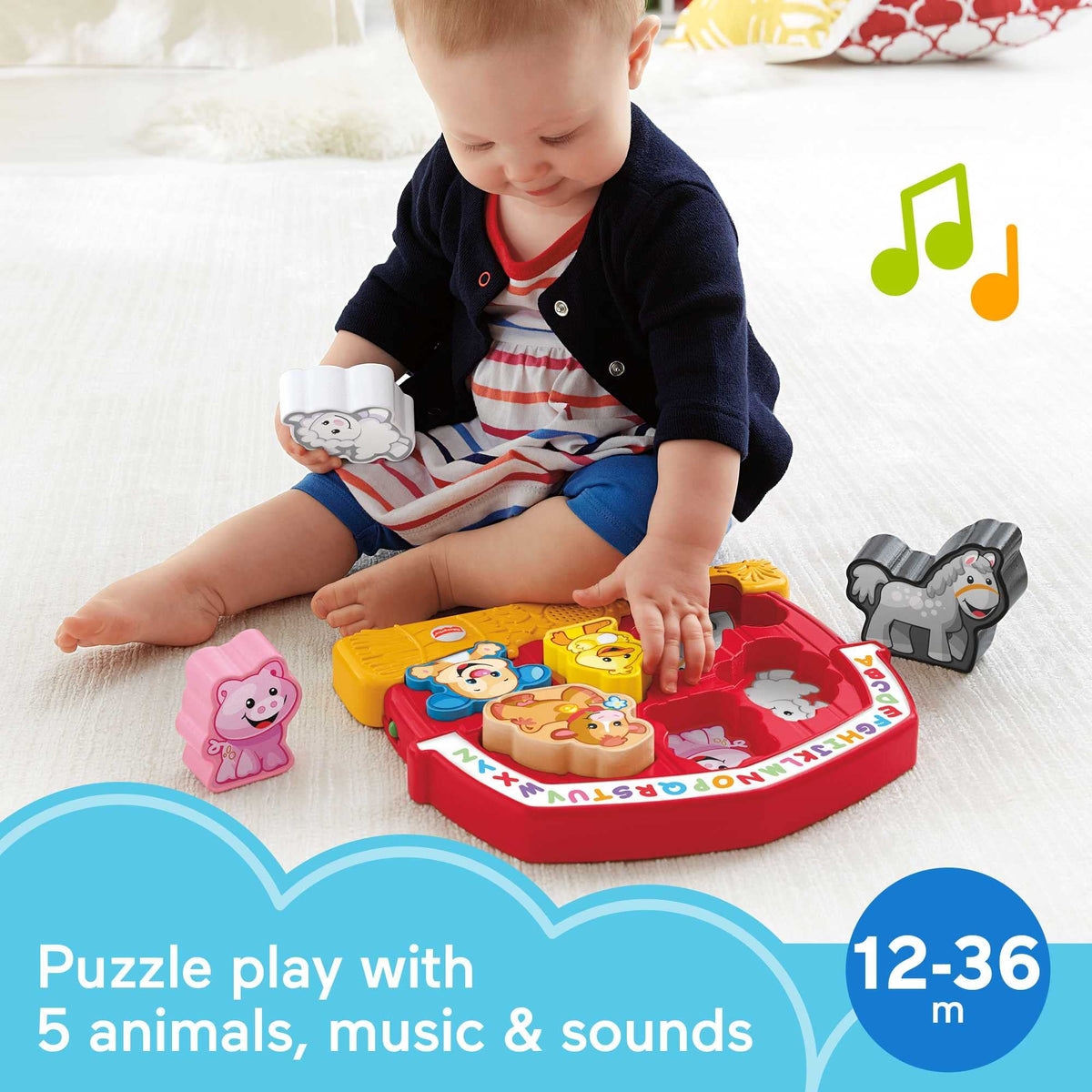 Close-up of farm animal shapes and songs from Fisher-Price puzzle