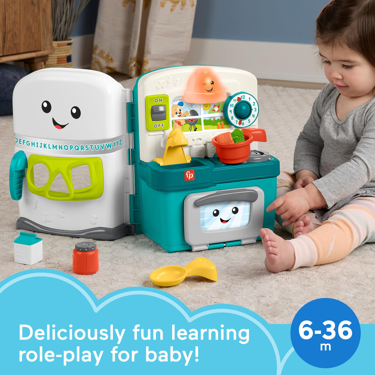 Fisher-Price Laugh & Learn kitchen oven door opens for pretend cooking fun.